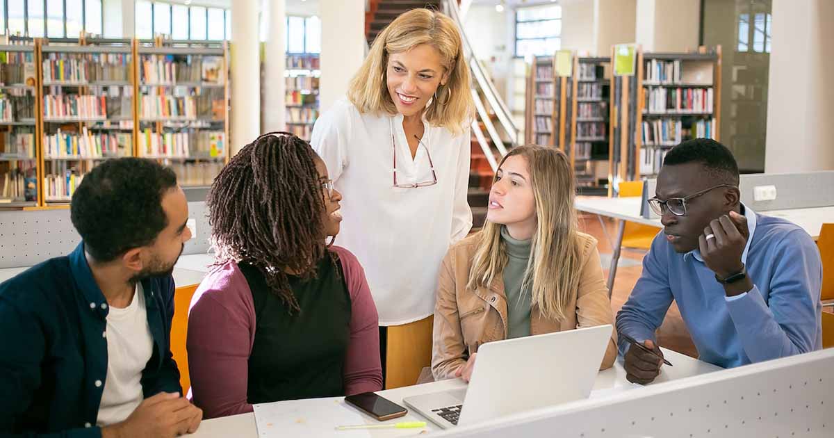 A woman talking to her team